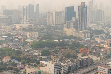 Obraz premium Aerial view of Dust in Bangkok city is full of harmful PM 2.5 dust with bad air pollution.