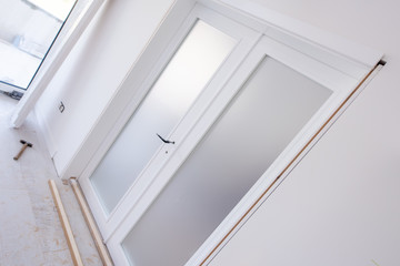 Fototapeta premium double glass door with white wooden frame