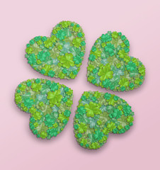 Green St. Patrick's Day Clover Flower Collage on Pink Background