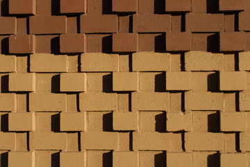 Dark light brown tan muddy cement brick wall