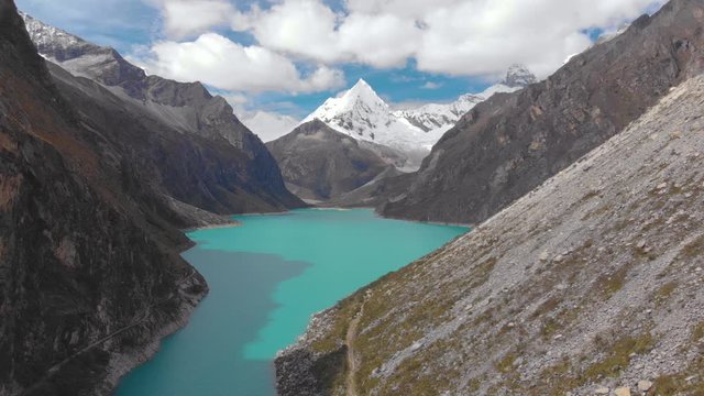 Paron lake with view to paramount mountain, fly going down