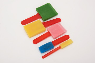 Sponge made of children's toy seals inside on a white background