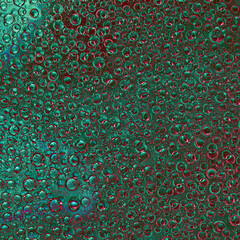 Pattern. Rings and spheres of different diameters, red, green and menthol colors are randomly...