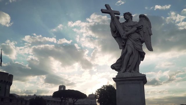 Angel statue outside of Castel Sant'Angelo in Rome. Gimbal shot with pivoting move.