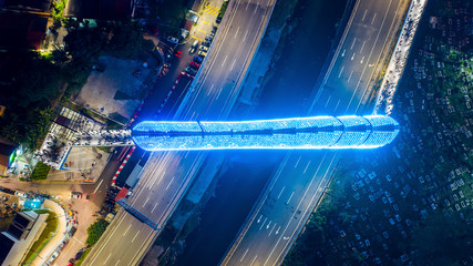 Kuala Lumpur, Malaysia - February 22, 2020 : Aerial drone view of newly opened pedestrian bridge Saloma Link connecting Kampung Baru with Ampang road.