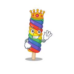 A cartoon mascot design of rainbow ice cream performed as a King on the stage