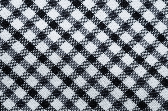 Black and white checkered fabric close up. squared pattern. geometric background