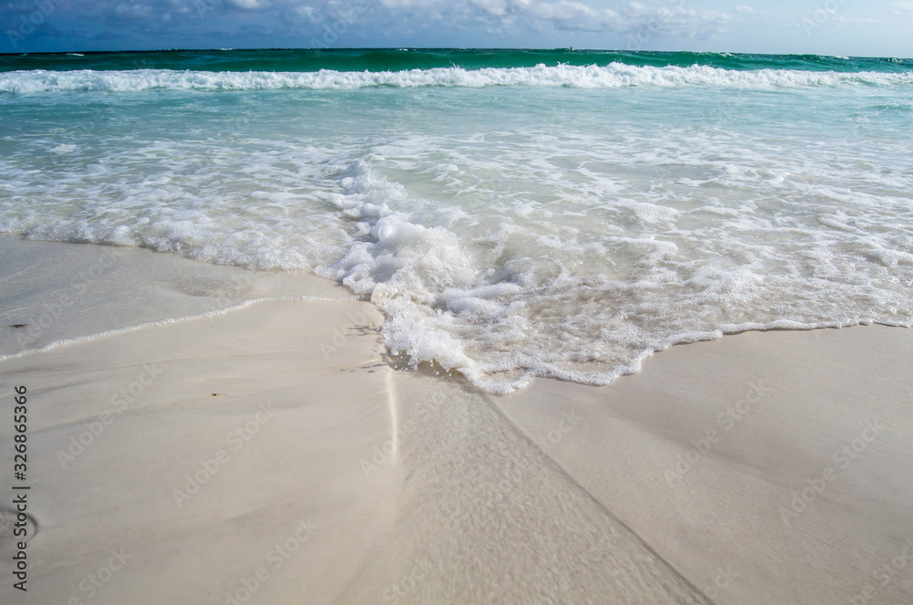 Wall mural sandy stream created by ocean