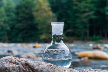 Glass flask with clean drinking water.
