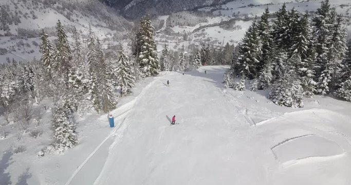 Beautiful aerial shot of skiers and ski lift in Bakuriani ski resort. 2023 years freestyle fis championship destination. Kokhta-Mitarbi Piste
