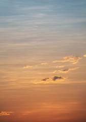 Heavenly abstract summer gentle background. Beautiful picturesque bright majestic dramatic evening morning sky at sunset or dawn. In orange and blue in pastel