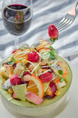 Fruit salad. Fresh Fruit Salad in Cantaloupe Bowl