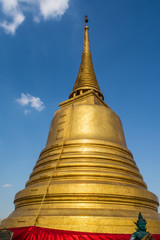 Fototapeta premium Phu Khao Thong or Golden mountain is a steep artificial hill inside the Wat Saket compound Bangkok Thailand.