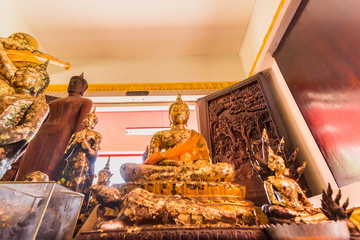 Samut Prakan, Thailand - February,23, 2020 : Buddha altar table set inside the at Wat Asokaram, the most famous landmark in Samut Prakan, Thailand