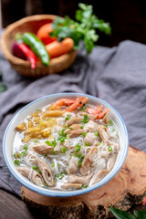 Rice noodle soup with many delicious ingredients
