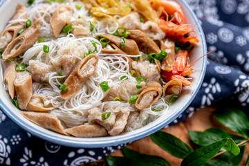 Rice noodle soup with many delicious ingredients