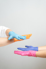 female hands in medical gloves