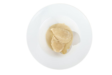 chicken breasts with mushroom creamy, sour cream sauce on a plate, isolated on a white background. For a menu in the restaurant, bar View from above