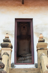 buddha statue in door of church in temple Phutthaisawan Temple in Ayuthaya
