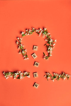 Femen on wooden alphabet, symbolizing woman gender and equality