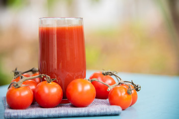 Fresh tomatoes juice in drinking healthy concept.