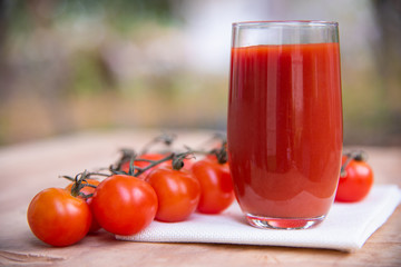 Fresh tomatoes juice in drinking healthy concept.