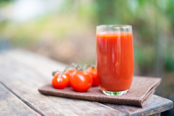 Fresh tomatoes juice in drinking healthy concept.