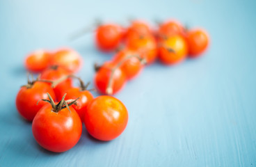 fresh tomatoes  on wood table.