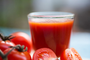 Fresh tomatoes juice in drinking healthy concept.
