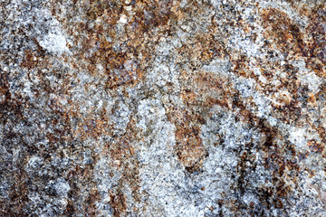 Sea stone with top view and high contrast as background.