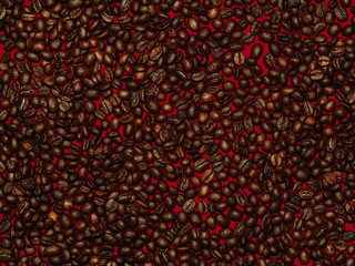 Roasted coffee beans on red background