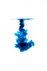 Color cloud in water. Ink in water. Abstract white background. Farbwolke in Wasser.