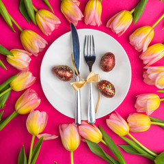 Easter table cutlery with tulips and eggs
