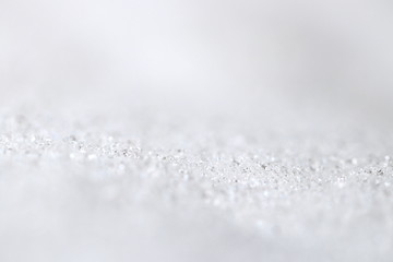 Hintergrund Winter - Nahaufnahme von Schneekristallen mit viel Textfreiraum