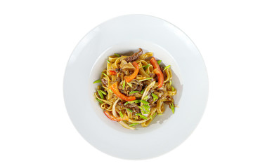 Pasta, noodles with beef, lamb, meat, Pad Thai, decorated with vegetables, bell pepper, chives, Isolated white background, view from above, Serving a meal in a cafe, restaurant.