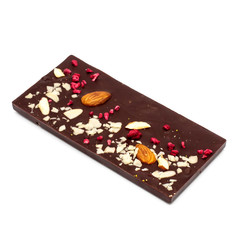 Handmade dark chocolate bar with a variety of dried fruit and nut toppings