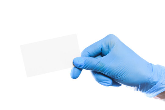 Doctor hand in sterile gloves holding card with text palce   isolated on white background - Image