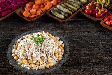 Turkish traditional street food chicken and rice with chickpeas. Tavuklu pilav with ayran concept.