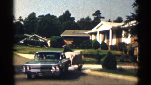 TEXAS USA-1963: Beautiful Blue Car Pulling Out Of Driveway Pulling Trier