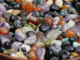 Medium close up of colorful gemstones and rocks