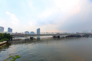 Fototapeta premium Rama VI Bridge and the Si Rat-Outer Ring Road Expressway Bridge View from Rama VII Bridge over the Cho Phraya River,Bangkok