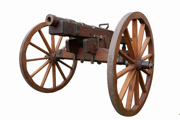Old vintage gunpowder cannon on wooden carriage with large wheels isolated on white background