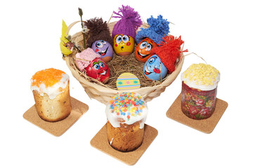 Easter eggs and cakes lie on the table.