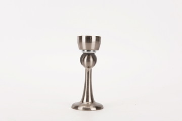 Various metal door stop tools on white background