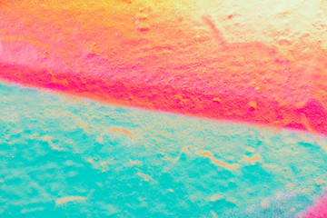 Beautiful bright colorful street art graffiti background. Abstract creative spray drawing fashion colors on the walls of the city. Urban Culture, black ,blue, purple , violet , neon texture