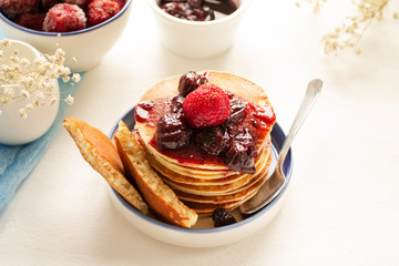 Healthy eating Pancakes in the fault. Pancakes for a week of Shrovetide with jam and fresh strawberries. Proper nutrition. Nutrition for vegetarians.