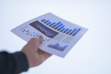 Businessman hand holding a document. Scenes white background.