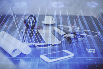 Double exposure of forex chart and work space with computer. Concept of international online trading.