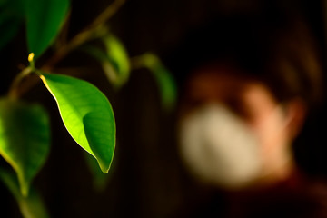 Out of focus girl wearing mask