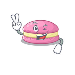 mascot of funny strawberry macarons cartoon Character with two fingers